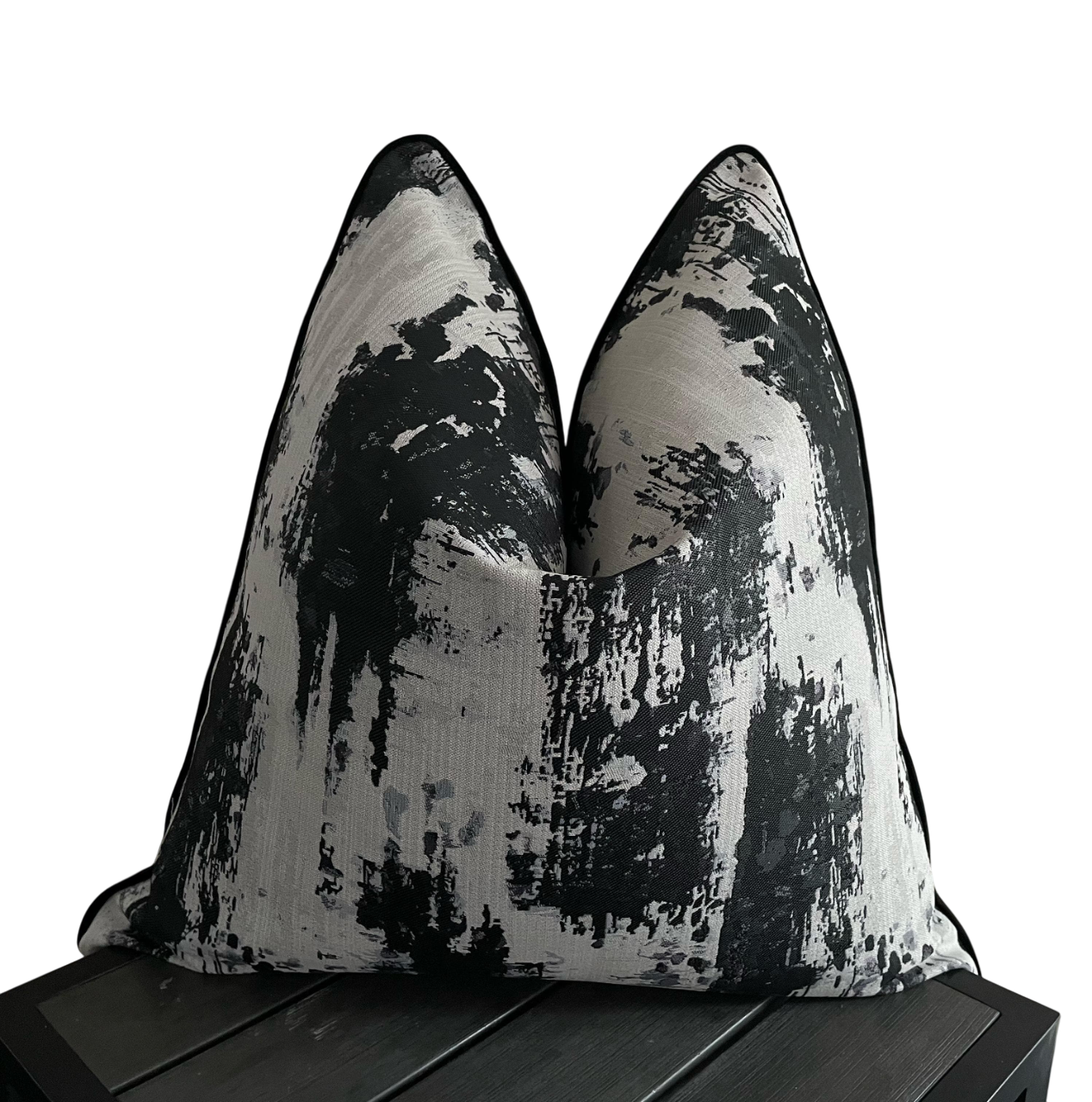 Black and white scatter with piping detail.