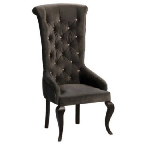 High back velvet dining chair with deep buttons.