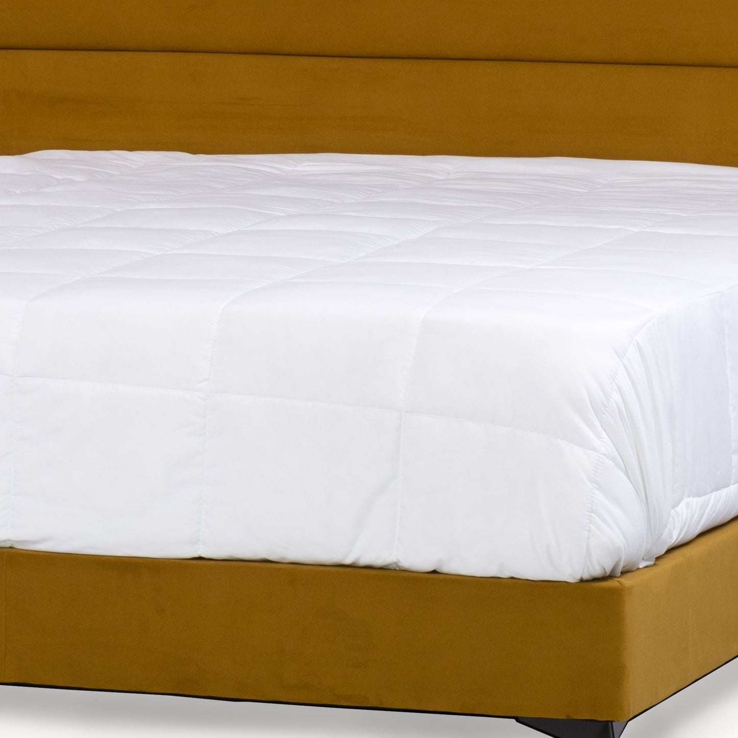 The Jones headboard and base bed in a luxurious mustard fabric