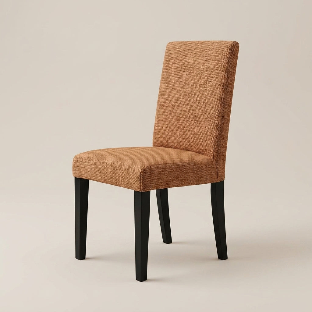 Paris Dining Chair Guilty Rust angled side view - rust orange fabric dining chair with solid dark wooden legs. Galeria Furniture South Africa