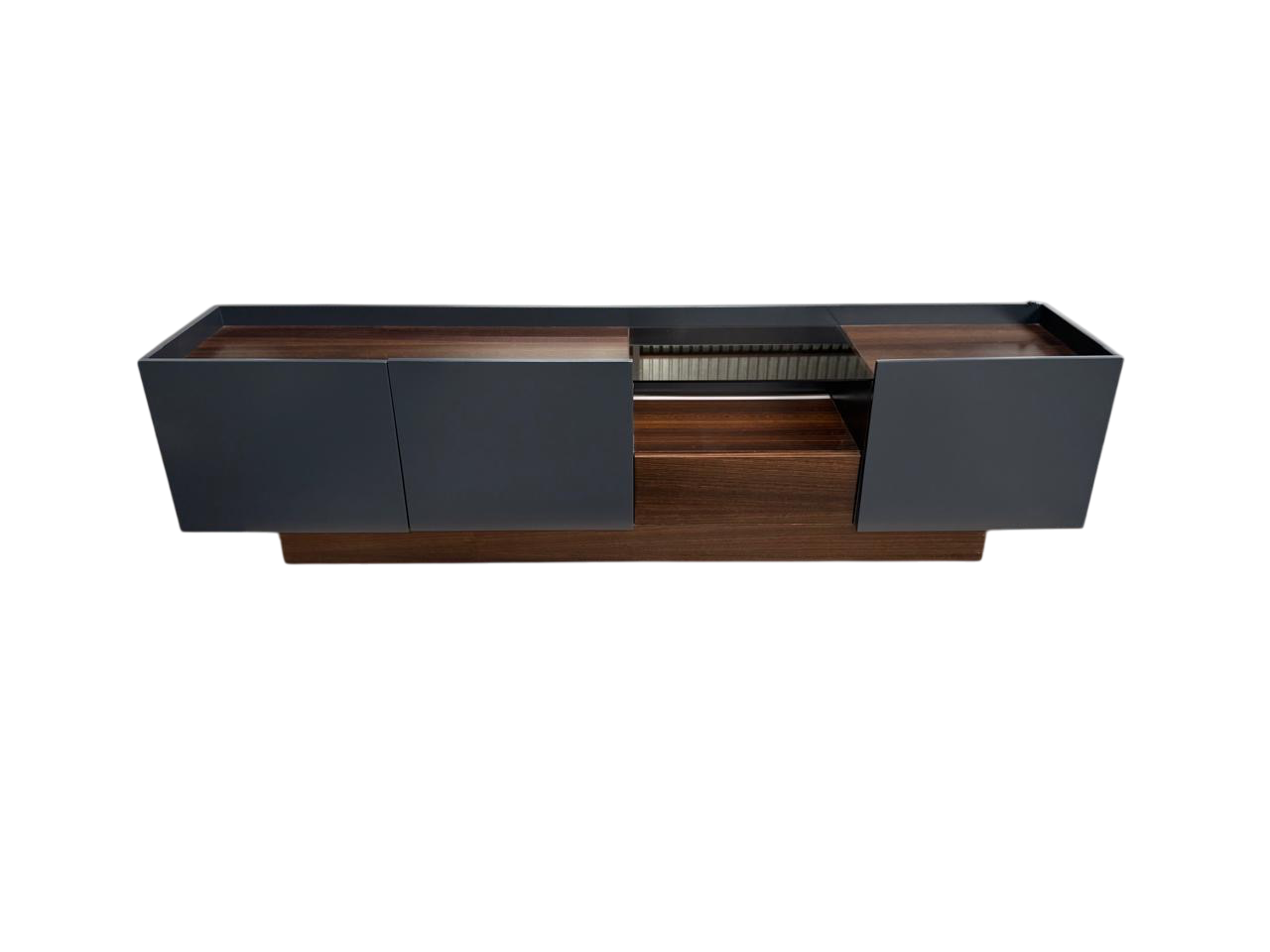 Modern entertainment console with dark blue and walnut wood finish, partial black glass top.