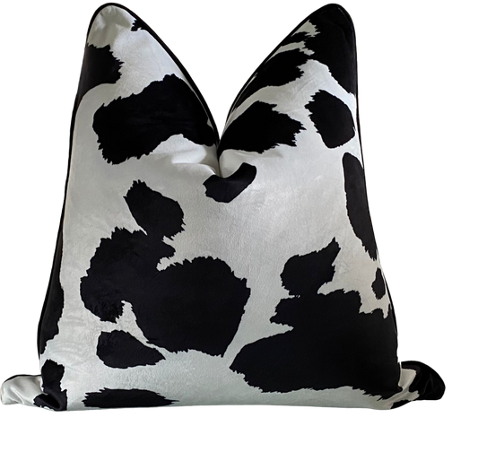 cow print scatter cushion with piping. Sized 60x60 scatter cushion