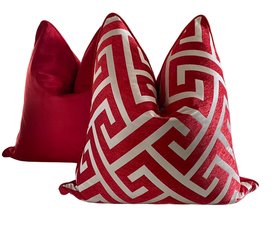 red and white geometric scatter cushion