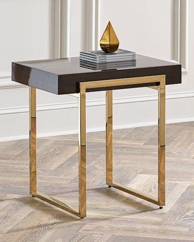 Wood -top side table with gold metal legs.