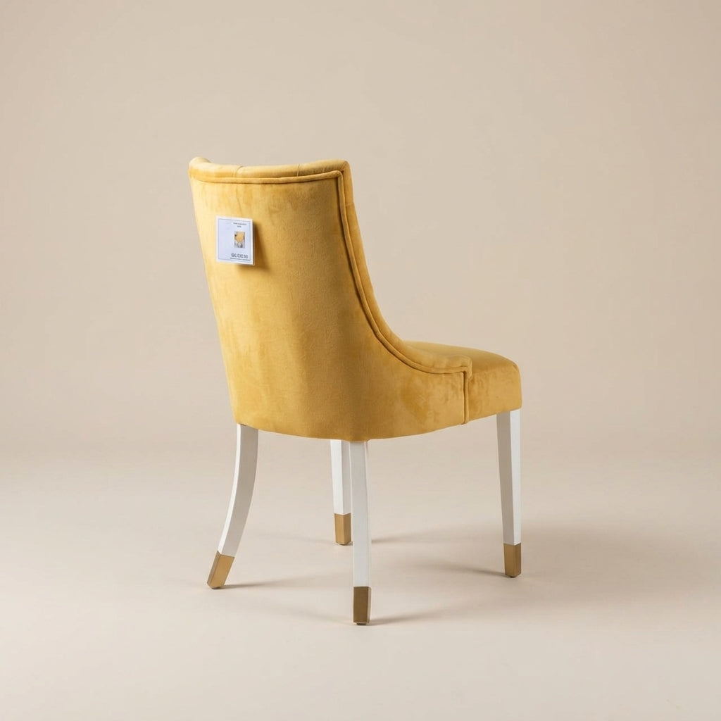 Depp yellow velvet dining chair with white legs and gold tips. Galeria Furniture SA