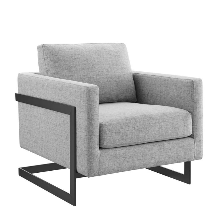 This armchair is square framed with black steel frame and legs. It is customisable in leather or fabric