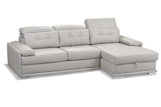 Grey leather L-shaped couch with adjustable headrests. and hidden storage trunk under the daybed.