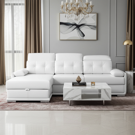 White leather sofa with adjustable headrests and storage trunk under daybed. Chaise daybed on the left.