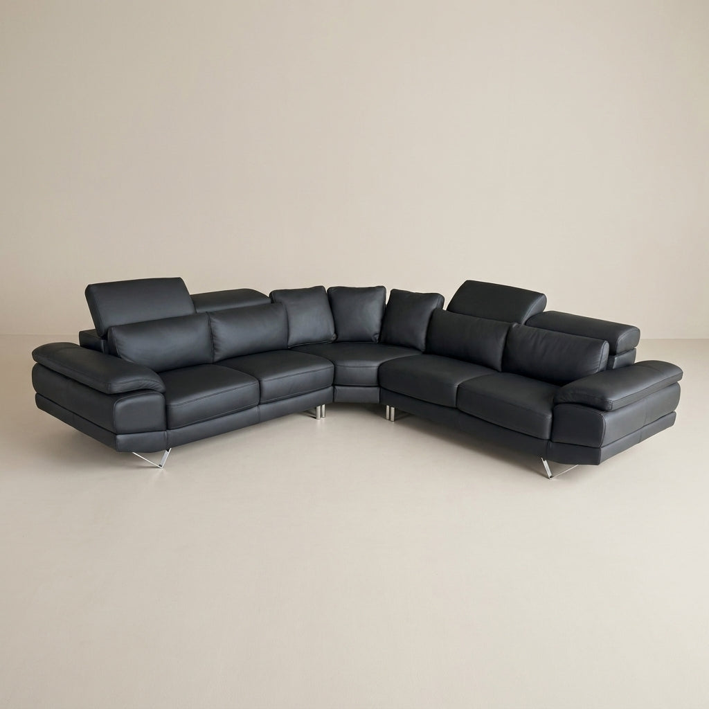 Luxury black leather corner couch adjustable headrests. Euro crafted sofa available exclusively at Galeria Furniture. Shipping nationwide.