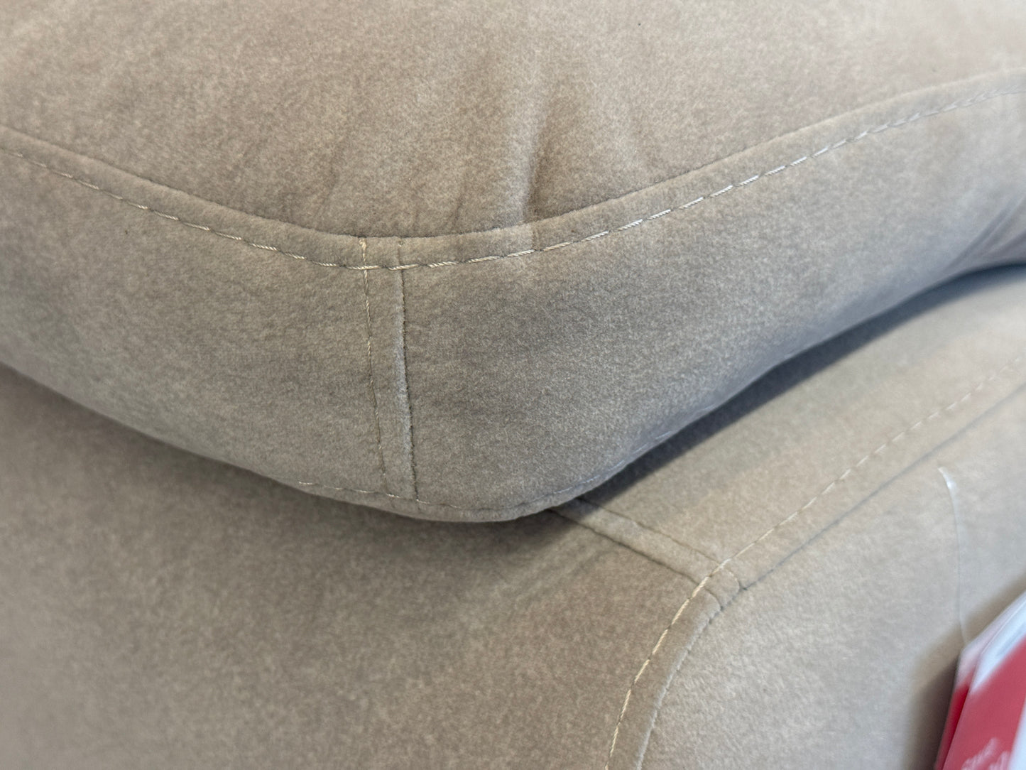 Close-Up of beige easy-clean fabric on the Dennis couhc. Galeria Furniture SA.
