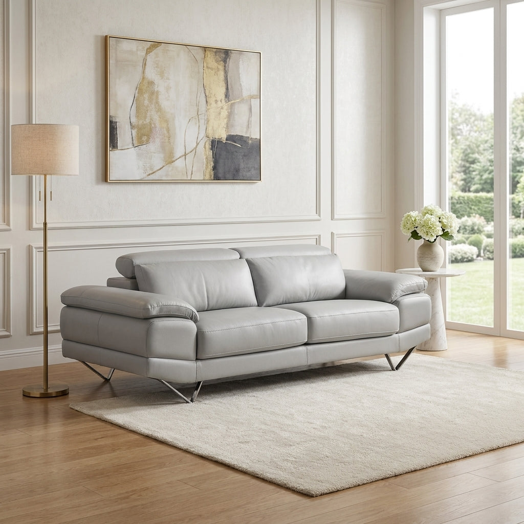 Grey leather European made couch 3 seater sofa adjustable headrests. Galeria Furniture Nelspruit. Delivery nationwide SA