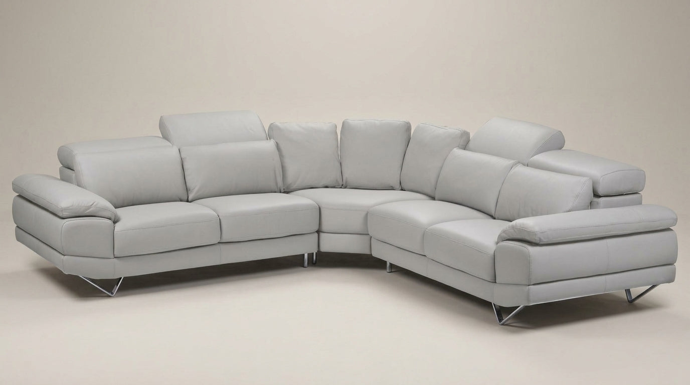 Luxury light grey leather corner couch , adjustable headrests. Galeria Furniture South Africa