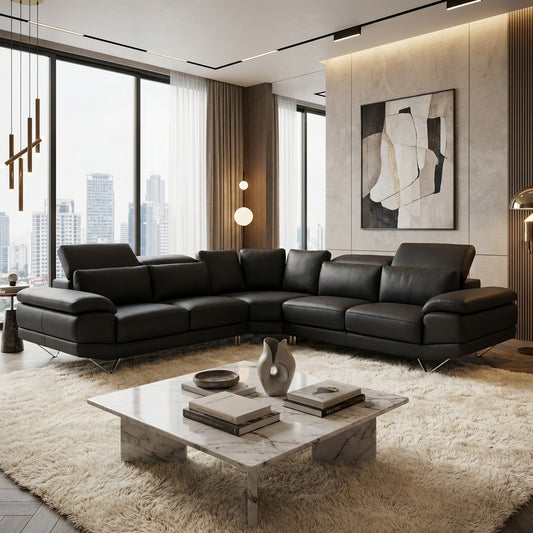 A black leather 6 seater corner couch with adjustable headrests.