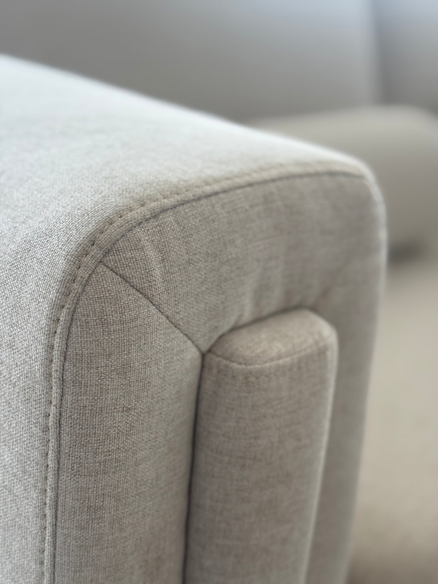 Close-Up of light grey fabric for a 2 seater JÀ sofa. GALERIA FURNITURE SOUTH AFRICA.