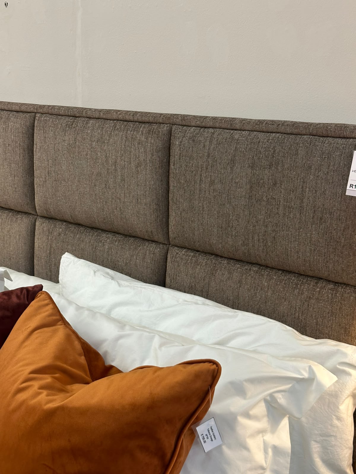 Close up of luxury chocolate abric on headboard and base. GALERIA FURNITURE SA. 