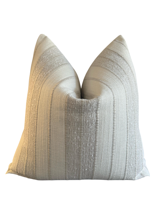 textured fabric scatter in natural tones