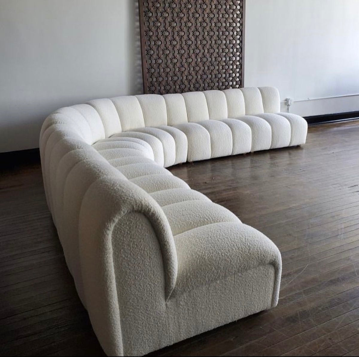 Square segment couch in boucle fabric. This couch is customisable in size and style.