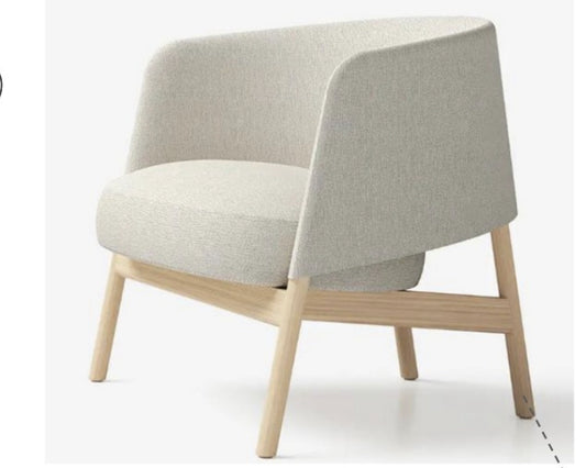 curved armchair in grey fabric with blonde wood legs