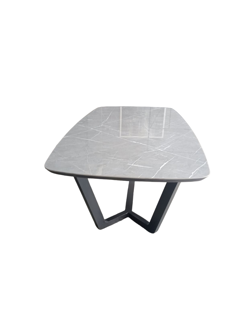 Light grey stone top dining table with black wooden legs. Custom made for a client.