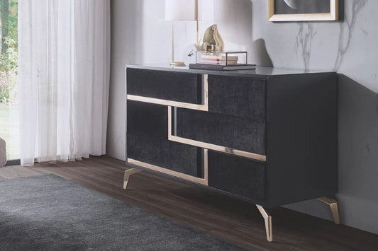 Chest of drawers in black wood with black velvet and gold metal strips