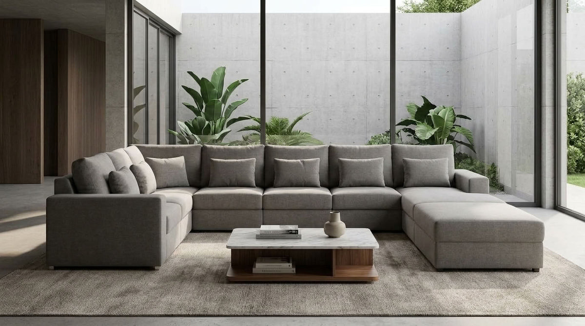 Large family sized grey corner couch with daybed and movable ottoman. Includes scatters. Euro Crafted. Superior comfort. GALERIA FURNITURE SA