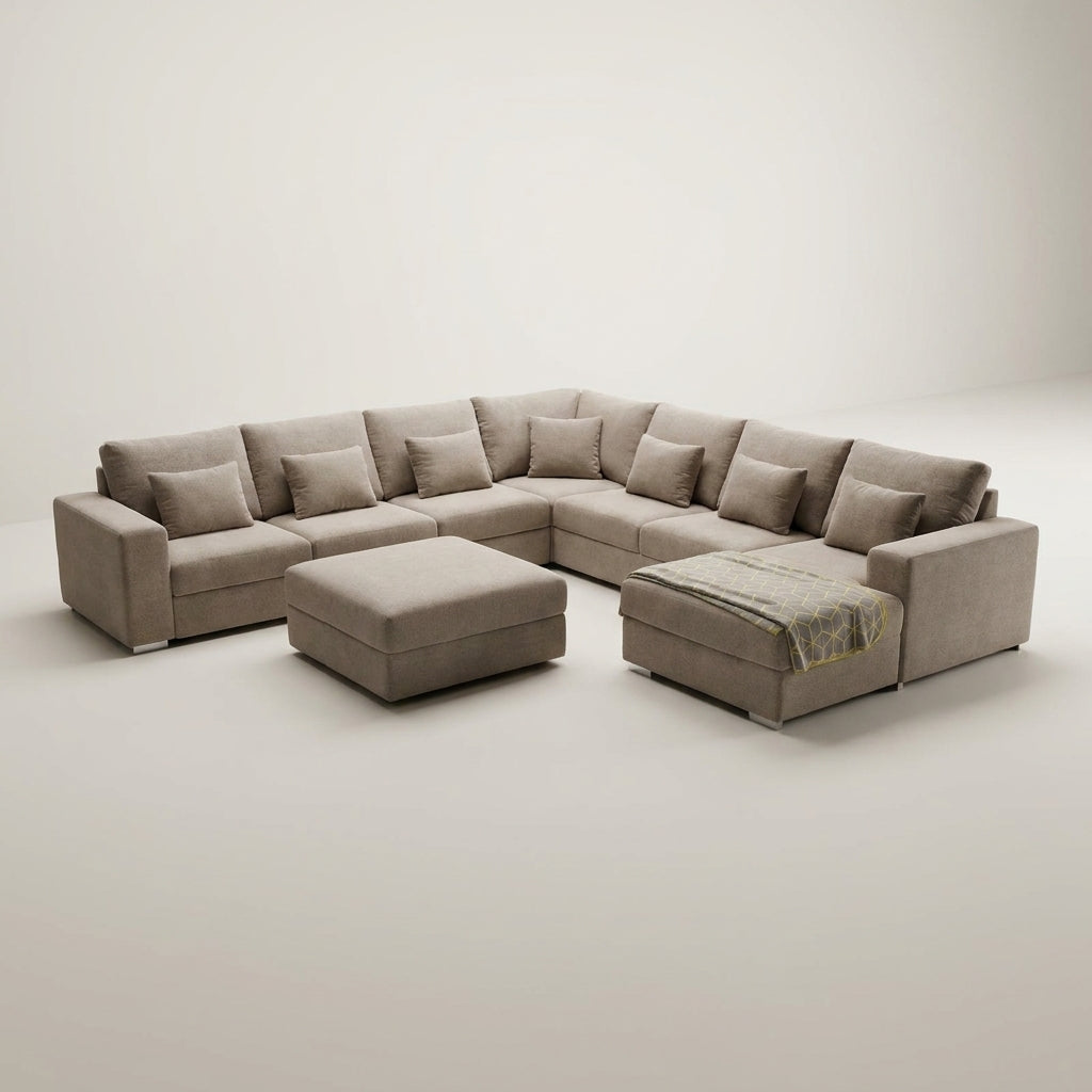 Large luxury fabric corner couch, handmade in Europe, sold exclusively at Galeria Furniture. This 8 seater sofa has a movable ottoman and a daybed.