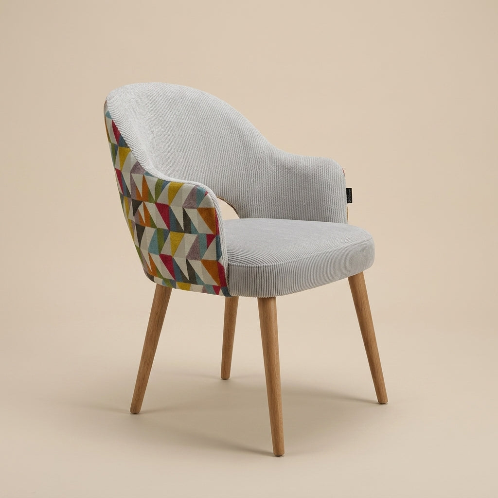  dining chair with gemoetric patterned fabric on backrest and softly textured light grey fabric front. Galeria Furniture SA