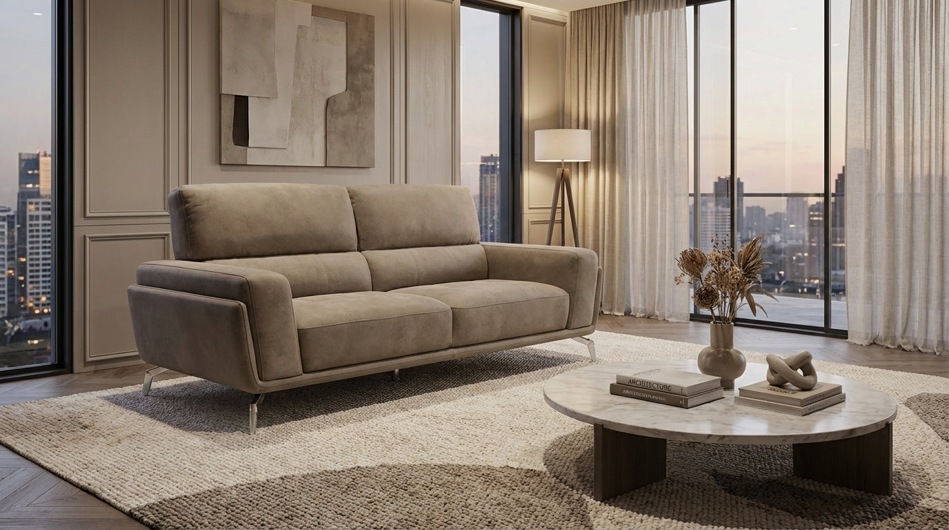 3 seater fabric couch in elephant grey fabric with chrome silver feet.