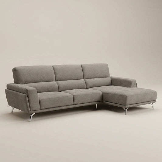 A designer corner couch in elephant grey fabric. This L-shape sofa is made in Europe and sold exclusively at Galeria Furniture. 