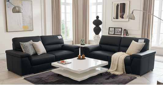 Black full leather , 2 seater + 3 seater sofa set, with chrome feet. Extra padded cushions for superior comfort.