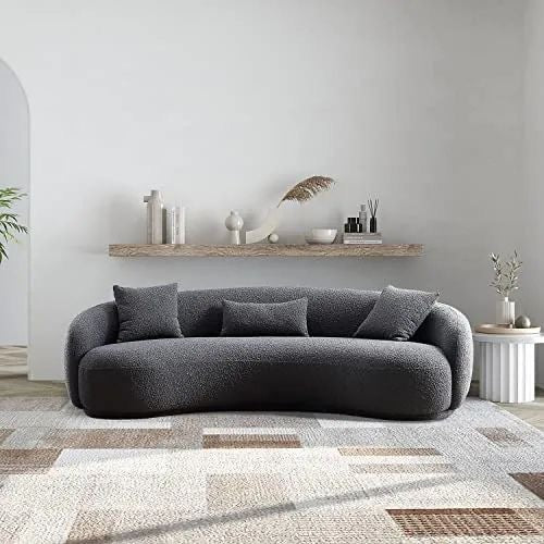 curve couch in grey boucle fabric