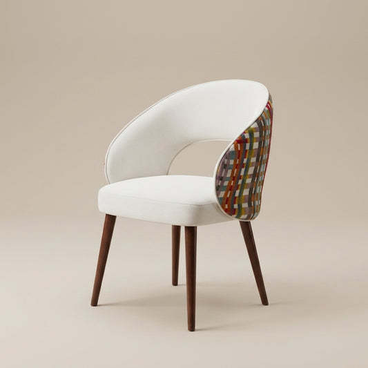 luxury dining chair with curved back and off white fabric front and multi coloured patterned fabric backrest.
