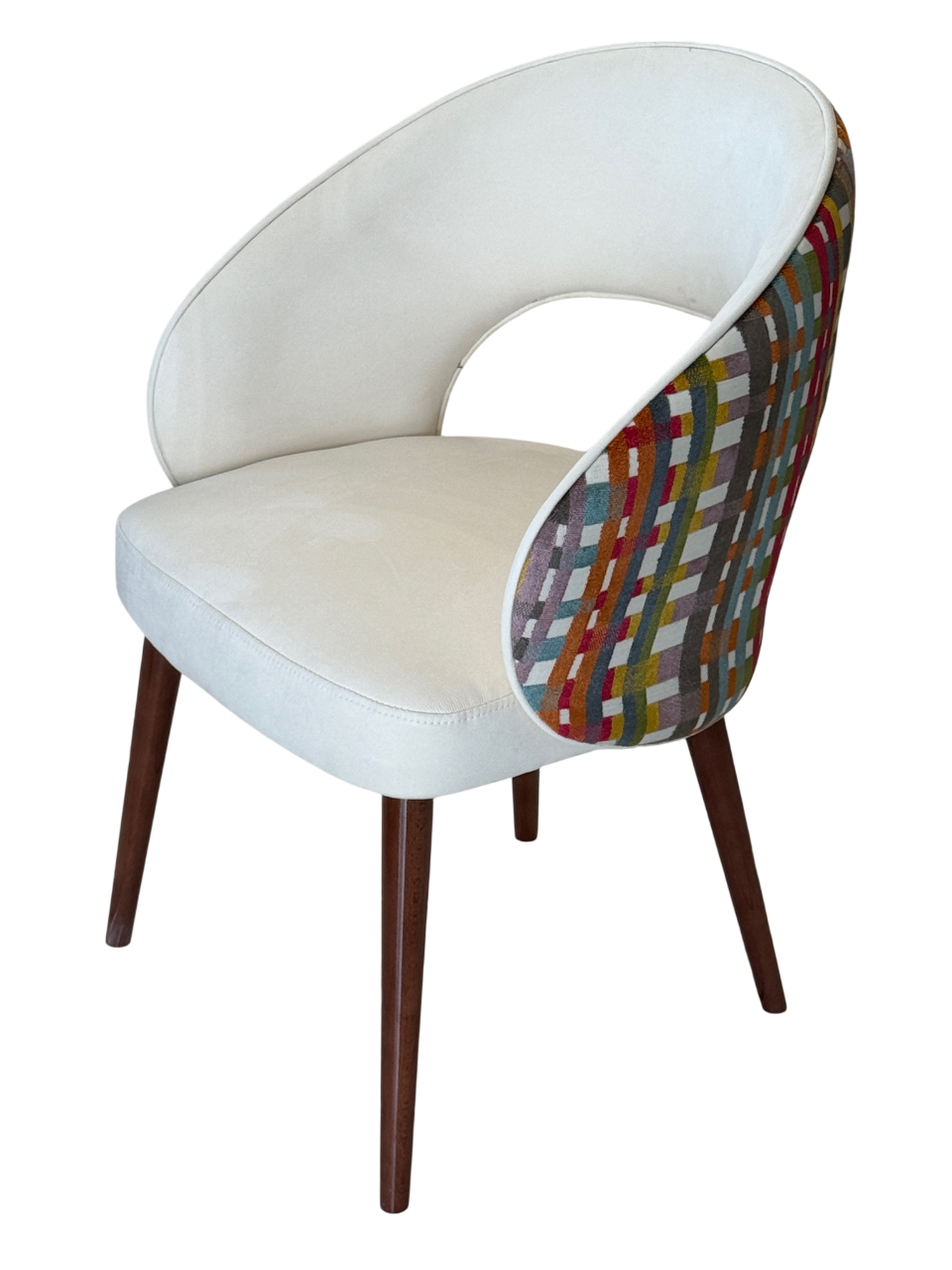 dining chair in two colour fabric- white front and multicoloured crisscross patterned back. 