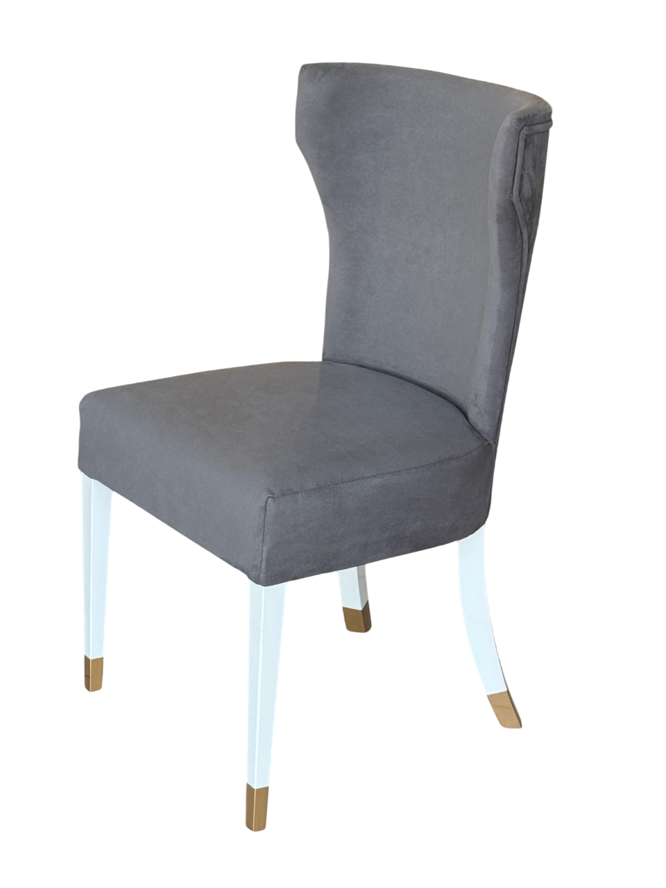 luxury wingback dining chair in mid grey fabric with white wooden legs and gold tip