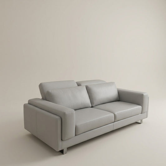 Designer grey leather couch chrome feet adjustable headrests. Euro crafted. Galeria Furniture South Africa