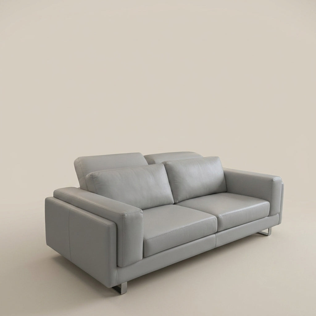 Designer grey leather couch chrome feet adjustable headrests. Euro crafted. Galeria Furniture South Africa