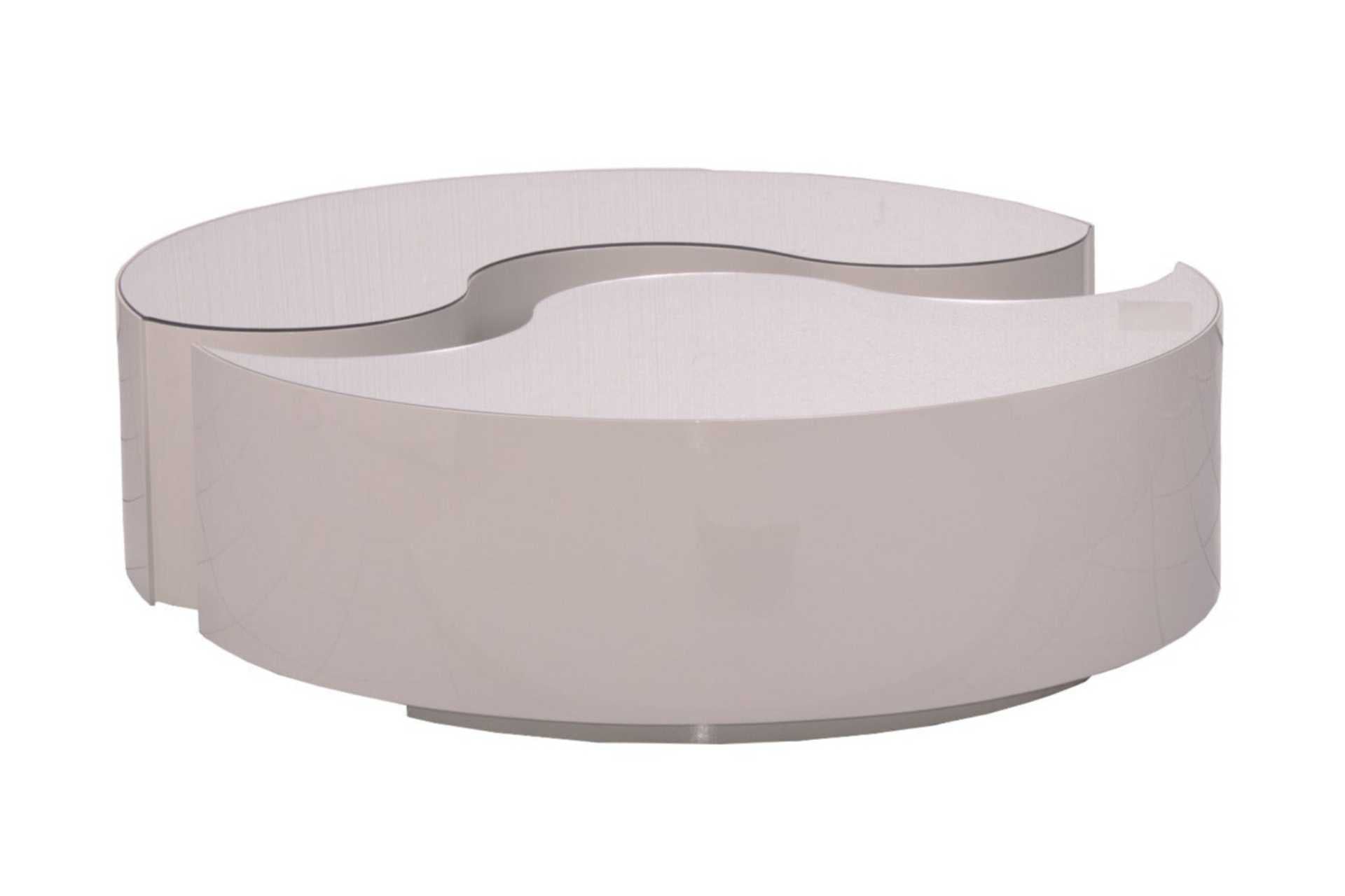 round coffee table in gloss beige wood
