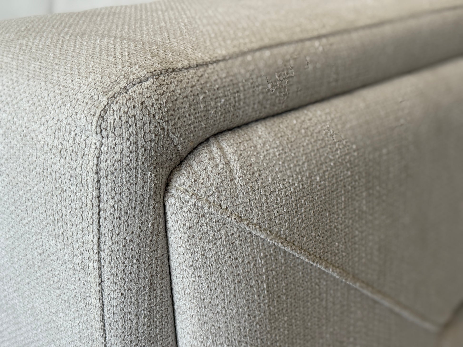 Close-up of textured light gray fabric for Zeller Couch. GALERIA FURNITURE SOUTH AFRICA
