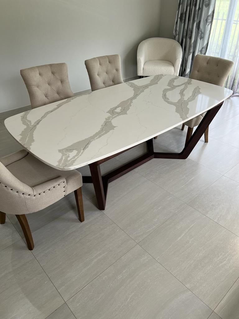 White and grey stone top dining table with wooden legs. Custom made for a client.