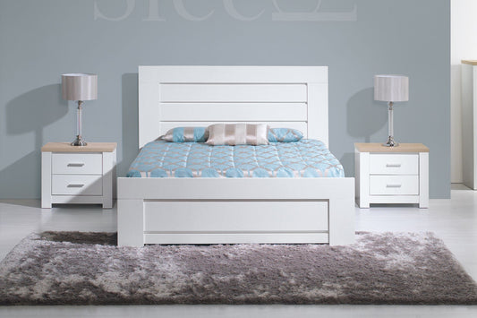 white wooden headboard and base set. White sleigh bed with matching pedestals.