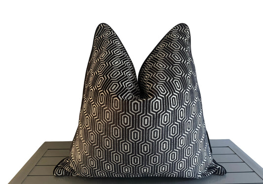 large luxurious scatter cushion in soft textured fabric with a black and white geometric design