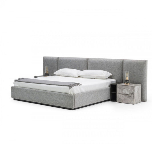 headboard and base set in upholstered light grey fabric with 4 squares on the headboard.