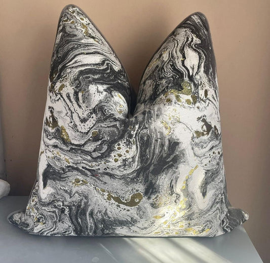 scatter cushion in marbled black and white with gold green tones. Scatter cushion sized 60x60 with elegant piping.