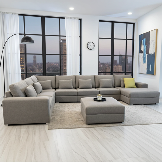 Grey fabric large corner couch with loose ottoman. 8 piece sofa .