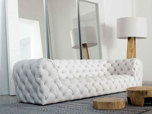 deep button chesterfield couch with rounded arms