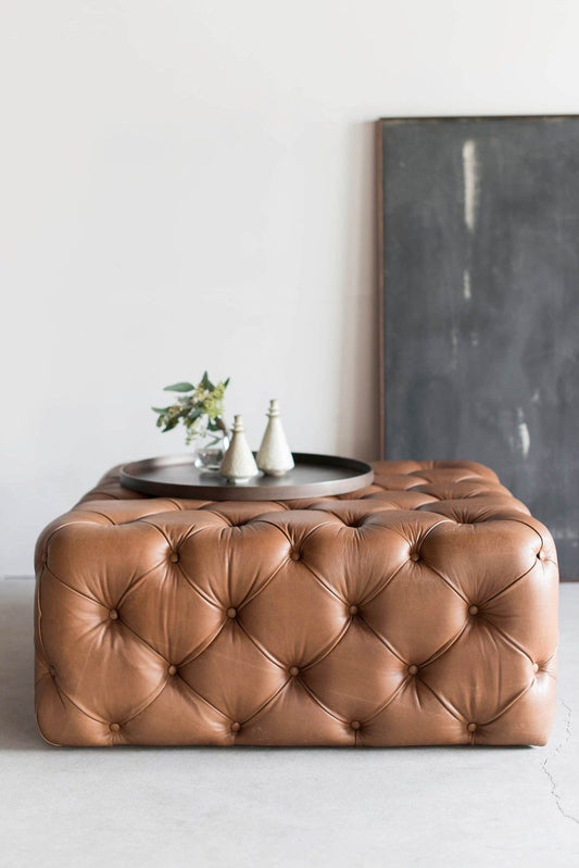 A deep button chesterfield ottoman upholstered in leather colour of your choice. Rectangular shape but can be made in any size or shape.