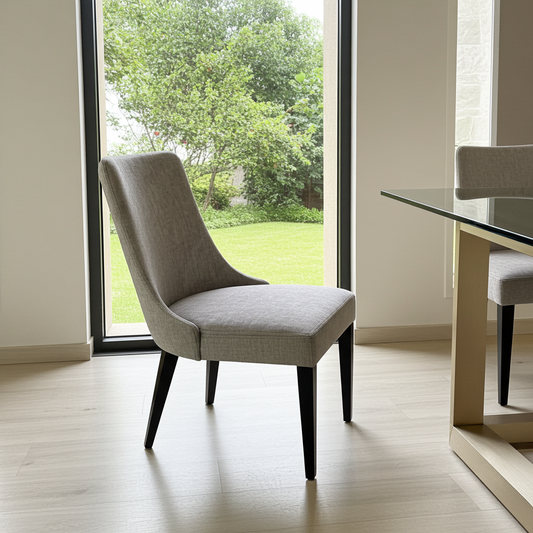 Luxury fabric dining chair with gloss black wooden legs.