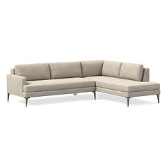 L shape couch in cream fabric with extra back cushioning and steel legs. This couch is customisable.