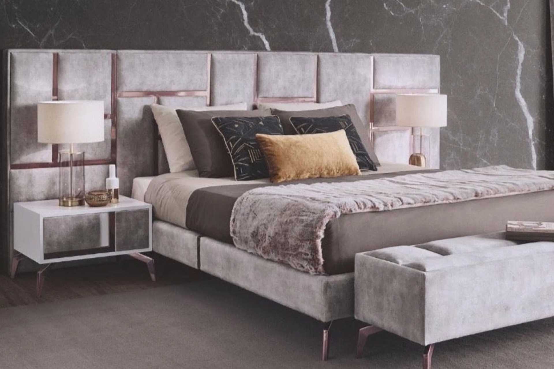 Grey and rose gold headboard and base bed set includes two bedside tables.