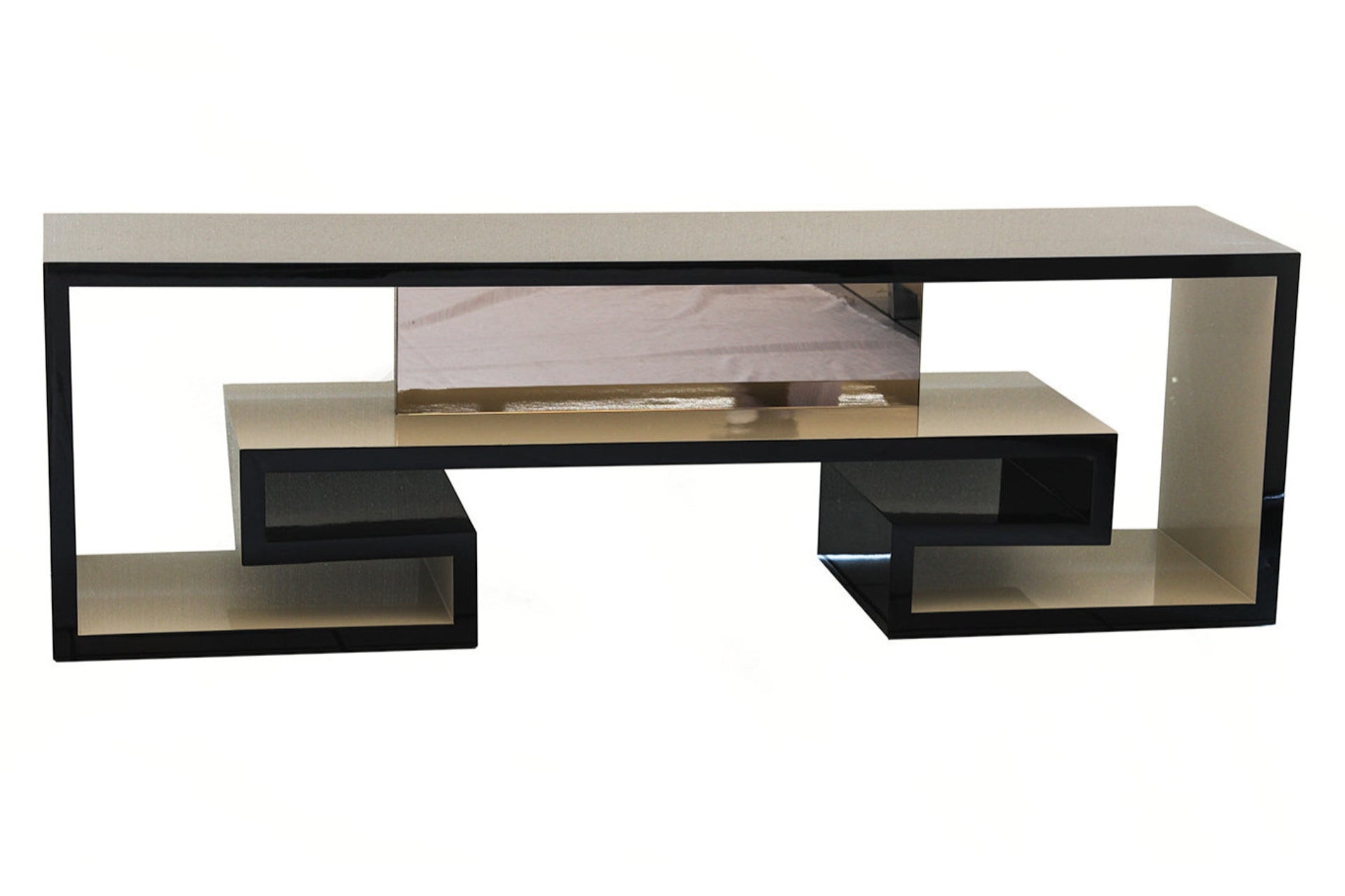 The Sublime side table can be used as a TV stand. Finished in black and gold gloss wood.